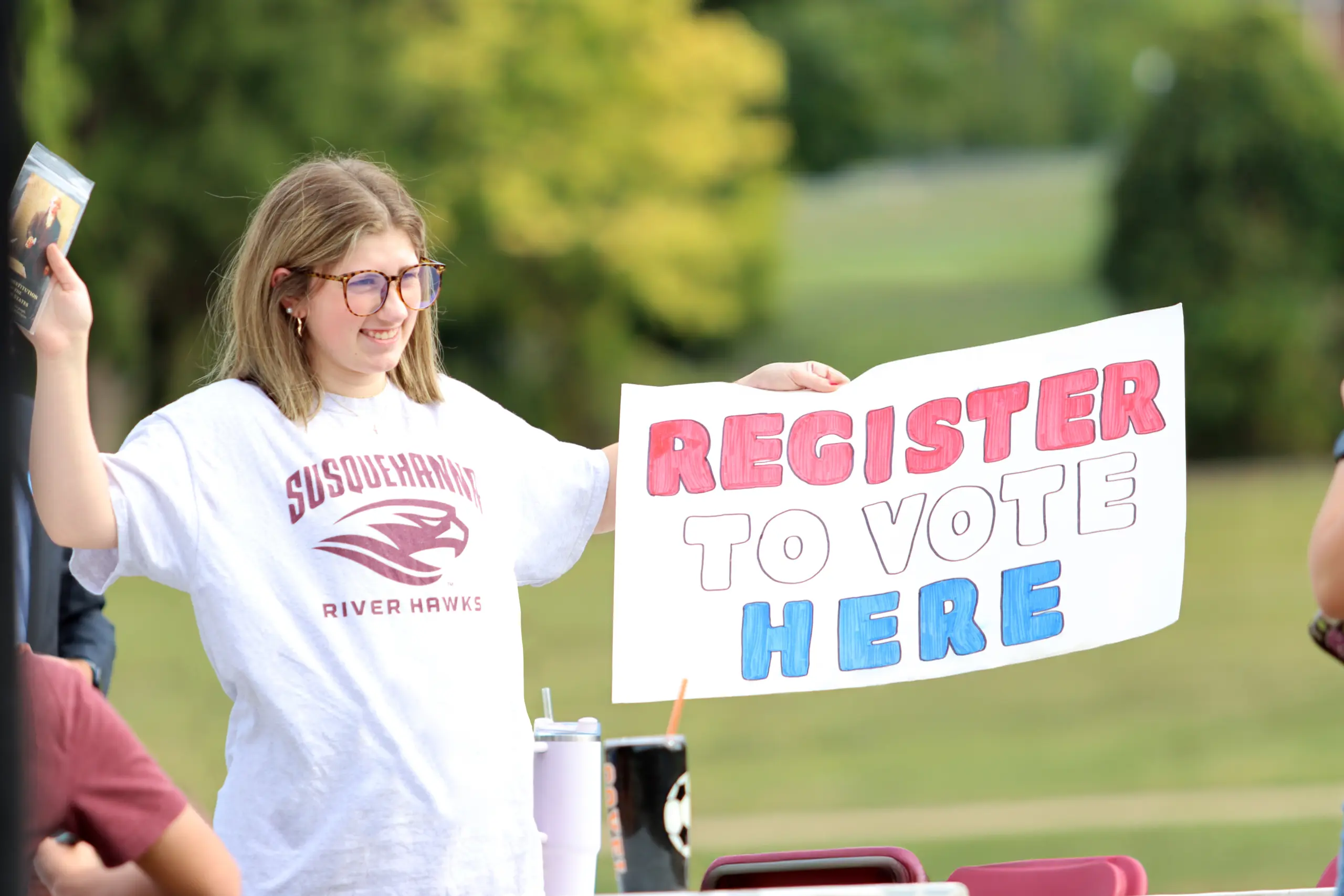 A person wearing glasses and a 
