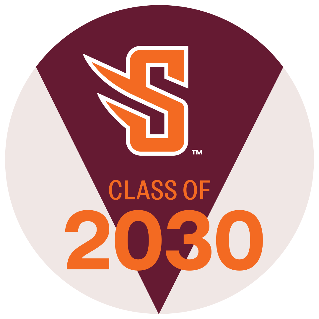 A maroon and white circular badge features an orange and white stylized 