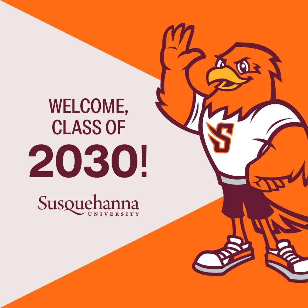 Cartoon bird mascot wearing a shirt with an 